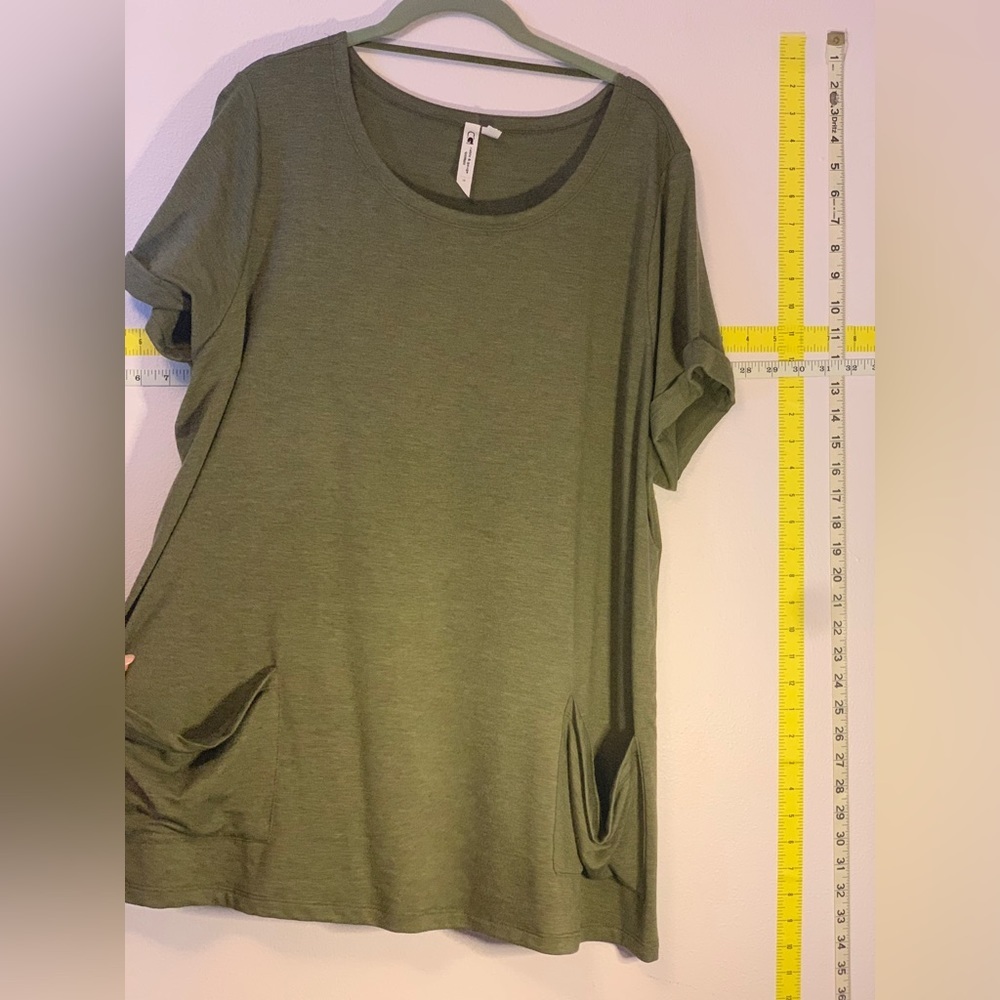 Sage green tee with pockets and rolled cap sleeves